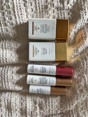 Drunk elephant Highlighter Sticks and Compacts in Gold, White,